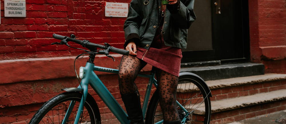 A Tenways E-Bike with a woman sitting on it