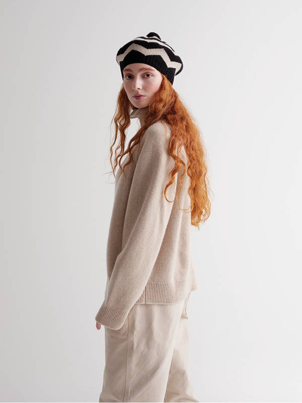 Model wears zigzag tammy black and oatmeal