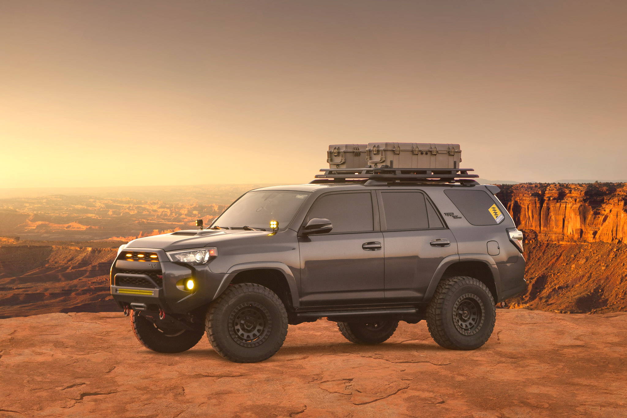 2019 Magnetic Grey Toyota 4-Runner Lifted with the HD Off-Road Overland Sector Venture Wheels in 17x9.0 in All Satin Black