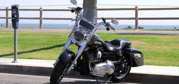 2013 HARLEY-DAVIDSON FLD 103 DYNA SWITCHBACK (VIVID BLACK) motorcycle for rent near Fountain Valley, CA
