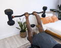 man doing skull crusher workout with EZ curl bar