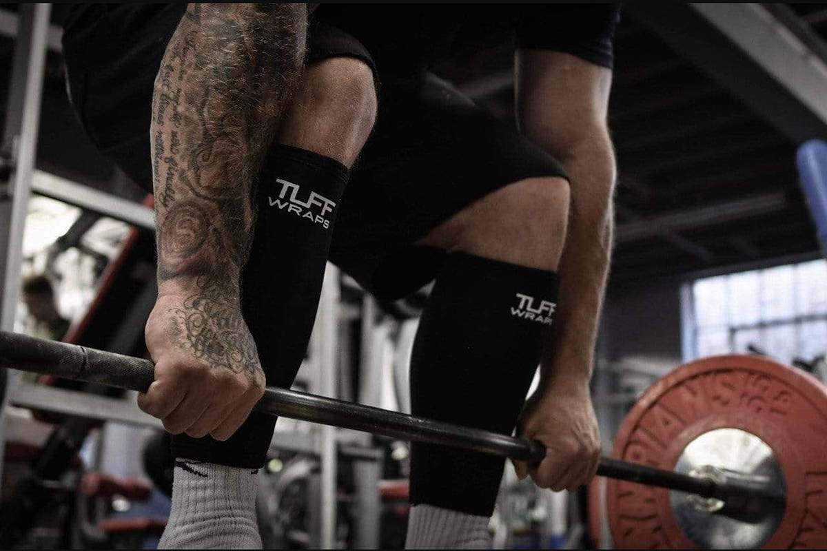 Powerlifter with a Barbell in Deadlift Shin Guards