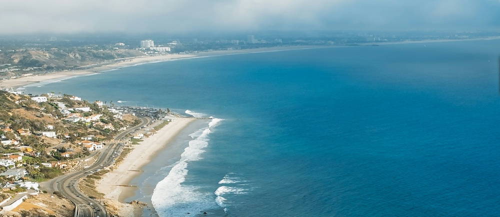 Photo by Brandon Russell on Unsplash aerial view of Malibu and pacific coast highway