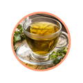Une tasse de thé avec aux Ortie avec des orties  a coter spécifier les ingrédients bio de la recette jouvence le thé minceur 
