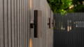 Modern outdoor wall lights installed on fence for ambient lighting in Rouse Hill by Havit