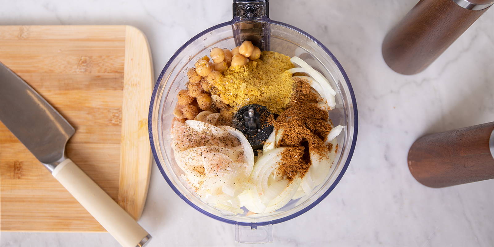 Making hummus at home with a lot of flavor from spices like coriander and cumin.