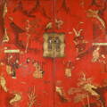 Gilt red lacquer detail from a Chinese antique wedding cabinet from Shanxi province