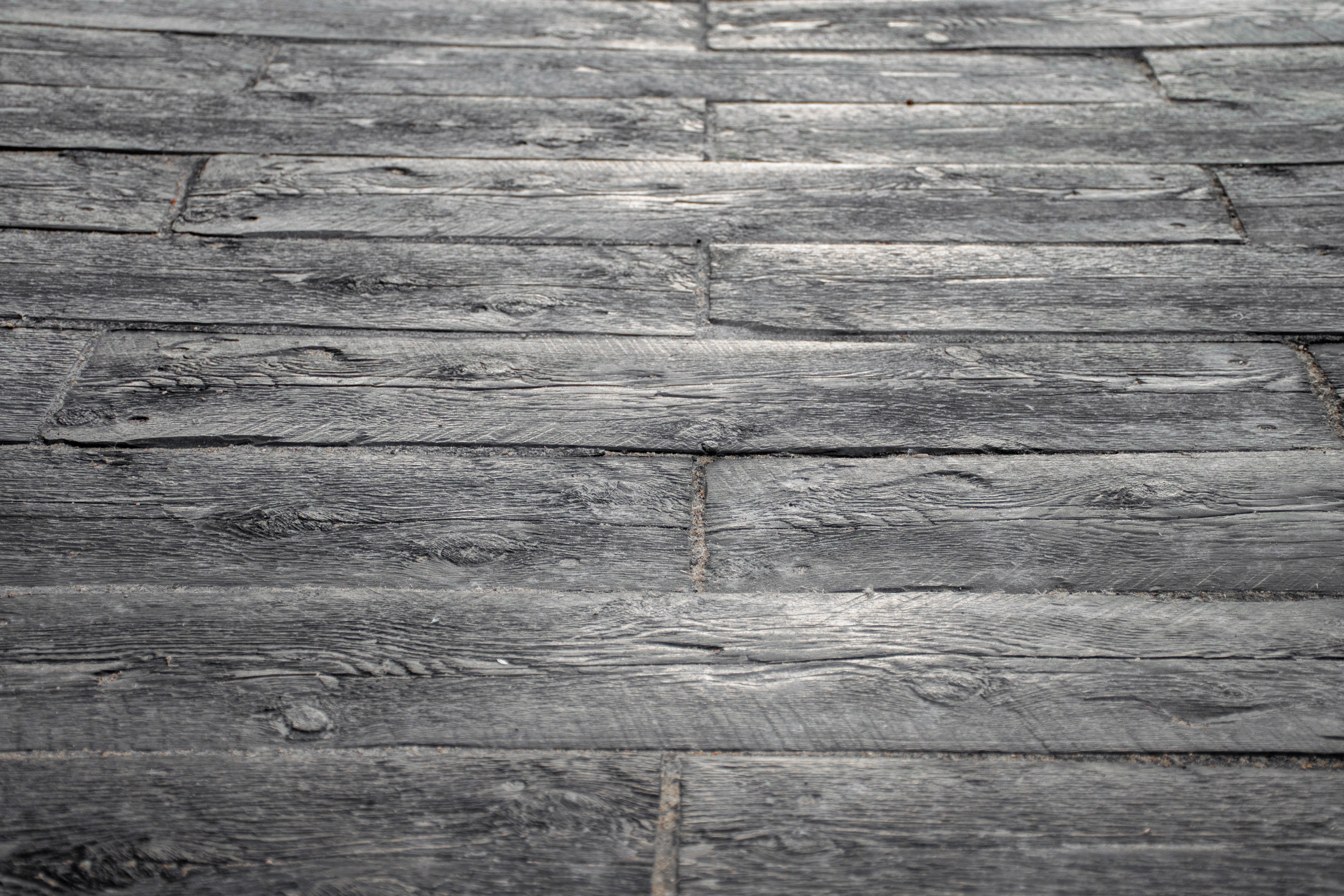 Patio Made with Barkwood Slabs that look like wood planks.