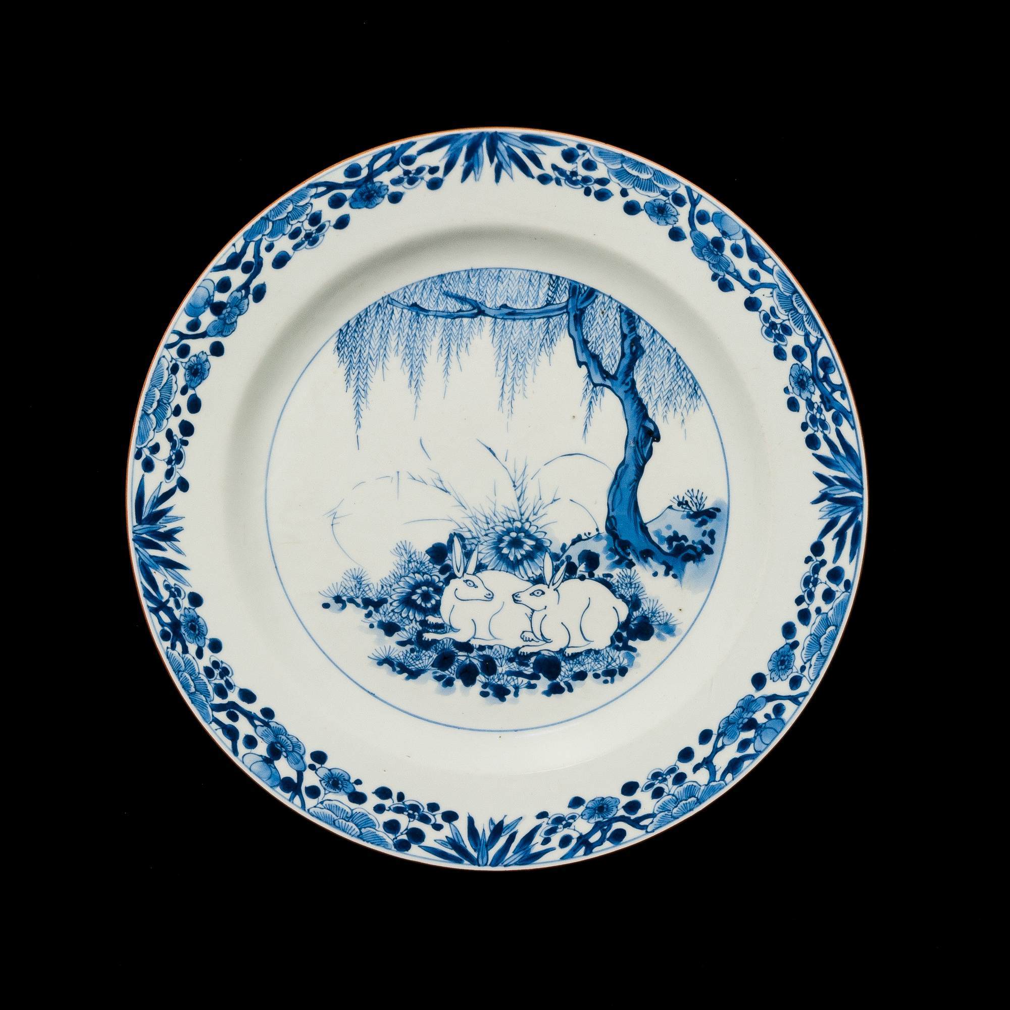 Image Credit: Dish Decorated with a Pair of Rabbits. China, Qing Dynasty, ca. 1661-1722. Porcelain with cobalt blue underglaze. h. 1 1/2 in. (3.8 cm); diam. 12 3/4 in. (32.4 cm). Gift of Lenora and Walter F. Brown, 2008.21.40.