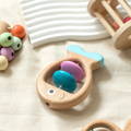 Montessori wooden fish rattle toy. 