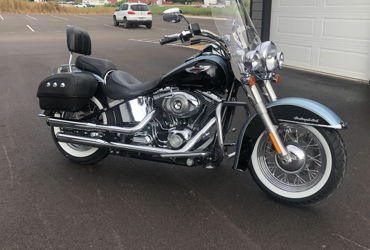 2008 HARLEY-DAVIDSON FLSTN SOFTAIL DELUXE (TWO-TONE) motorcycle for rent near Rapid City, SD