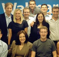 At Facebook, Kate Aronowitz [2nd row, l.] was a figurative heartbeat from the Sheryl Sandberg, Mark Zuckerberg throne.