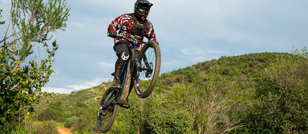 Electric mountain bike rider on jump