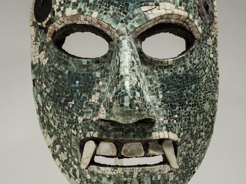 Image Credit: Mask. Mixtec, 1321-1421 CE. Wood, turquoise, and mother-of-pearl. h. 6 in. (15.2 cm); w. 5 in. (12.7 cm); d. 3 1/2 in. (8.9 cm). Bequest of Elizabeth Huth Coates, 97.1.18.