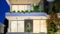 Havit architectural lighting softly highlighting a contemporary balcony facade.