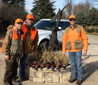 Todd Clarke and his son with Eric in Nebraska.