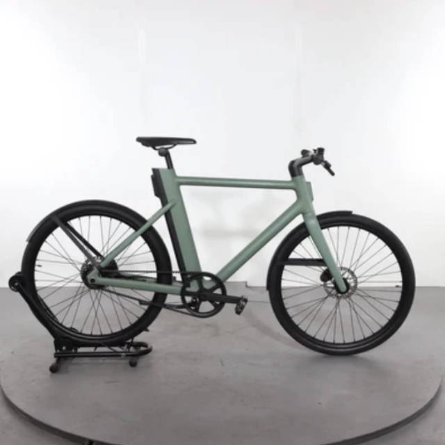 a green Cowboy Electric Bike