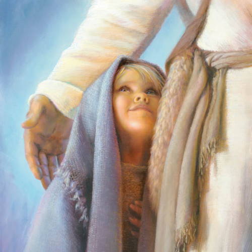 A small child standing under Jesus' arm and smiling up at Him.