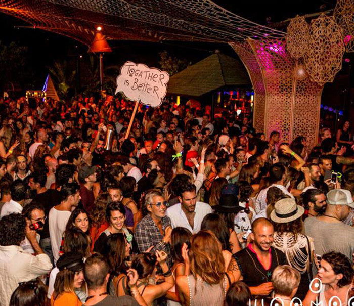 Guia discotecas aire libre Ibiza, cova santa fiesta Woomoon