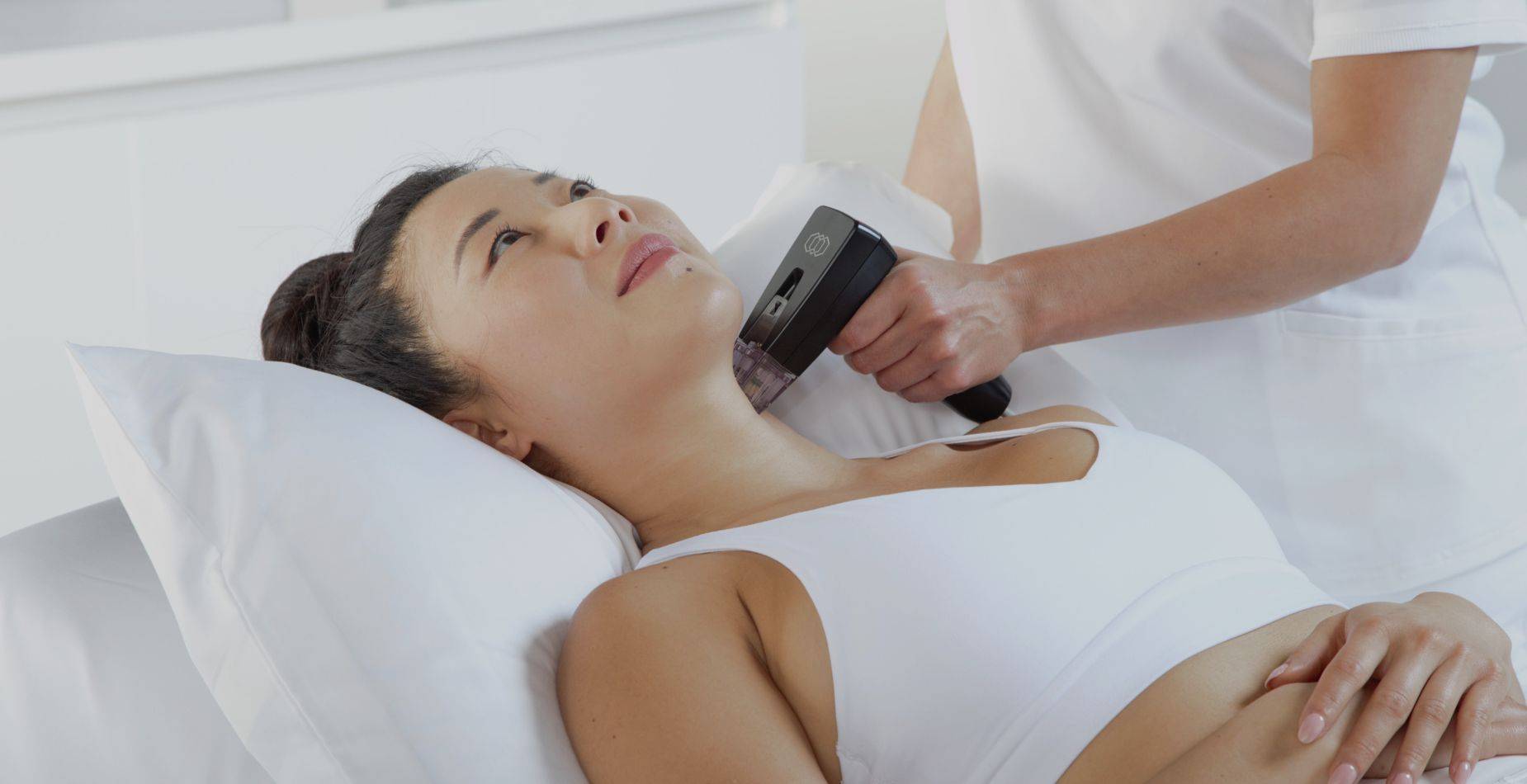 Model undergoing Morpheus8 treatment for facial rejuvenation at Studios Vis a Vis Toronto