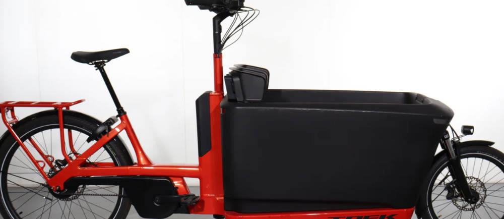 a red Trek Fetch+ 4 electric front loader cargo bike