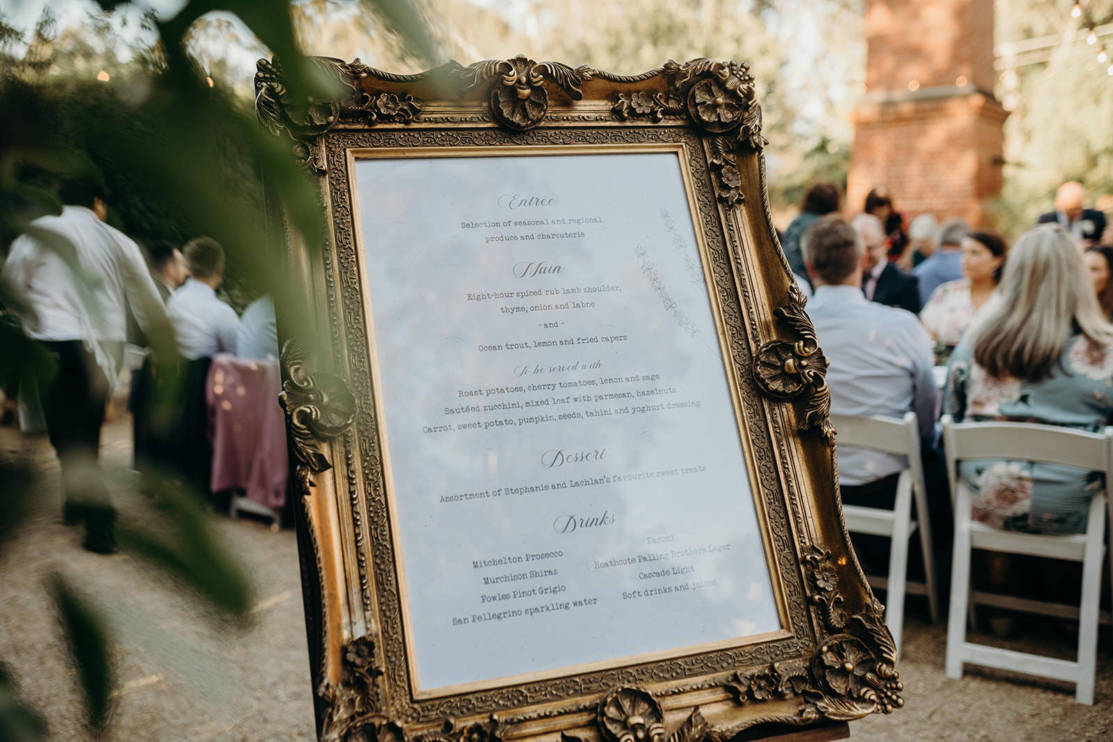 Printed Wedding Menu in Gold Frame at Rustic Wedding