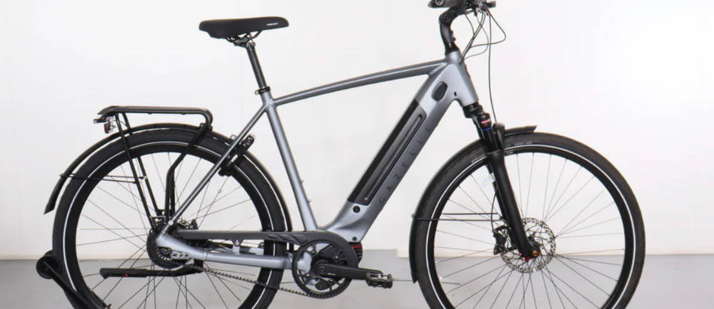 a silver Gazelle Ultimate C380+ electric city bike