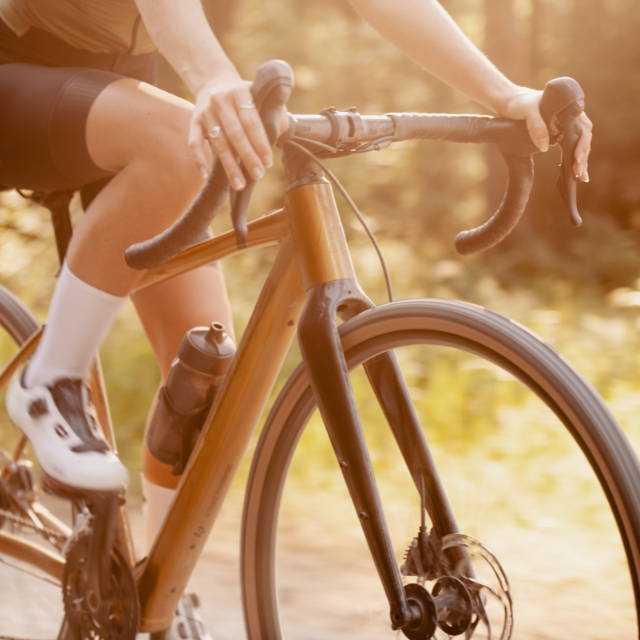 a person riding a La Pierre Road Bikes electric road bike