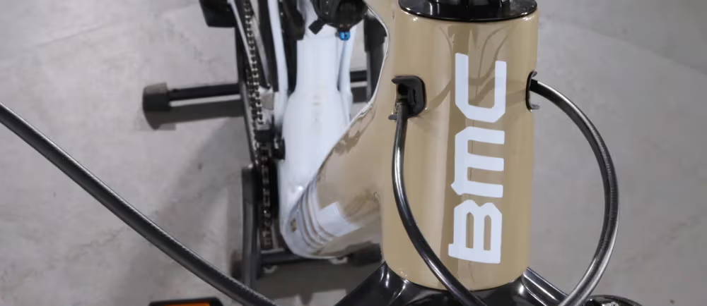 The front of a BMC e-bike showing the cables entering the frame
