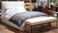 White slipcovered bed