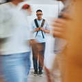 young-adult-male-standing-out-in-crowd