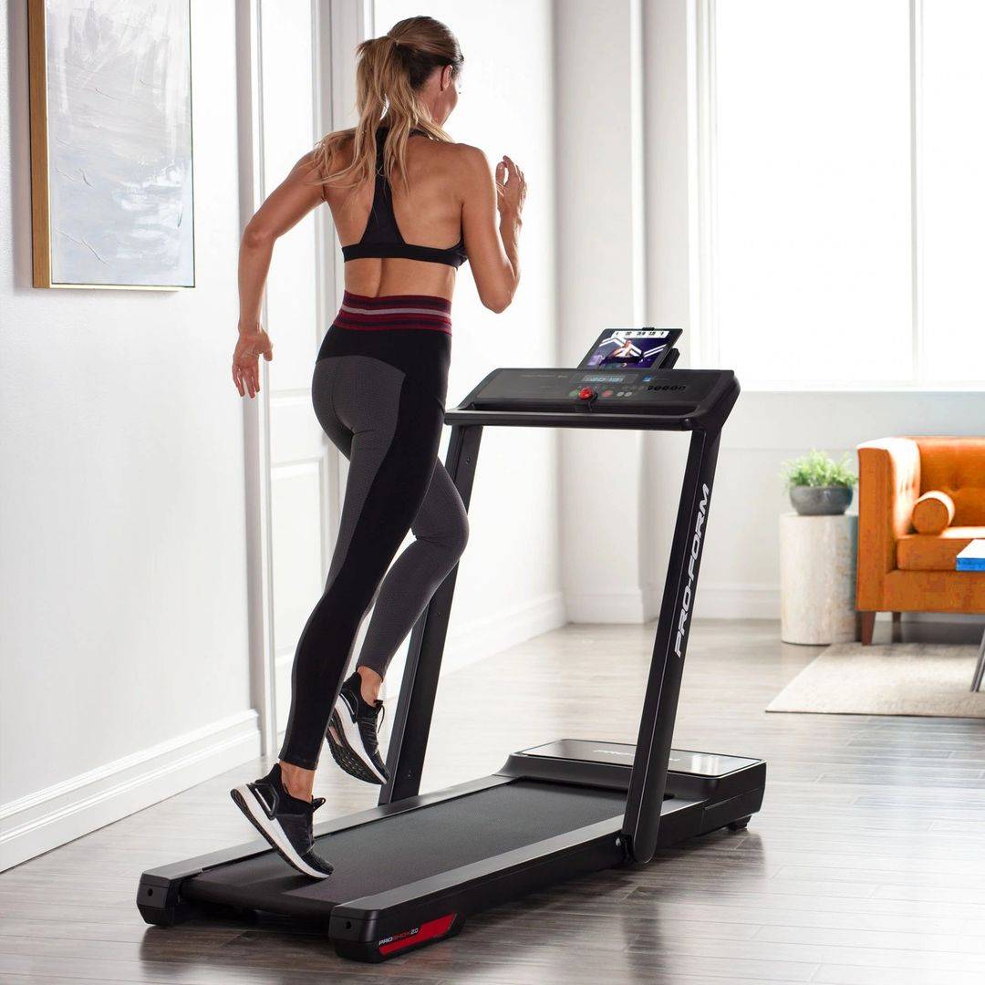 proform electric treadmill in a room