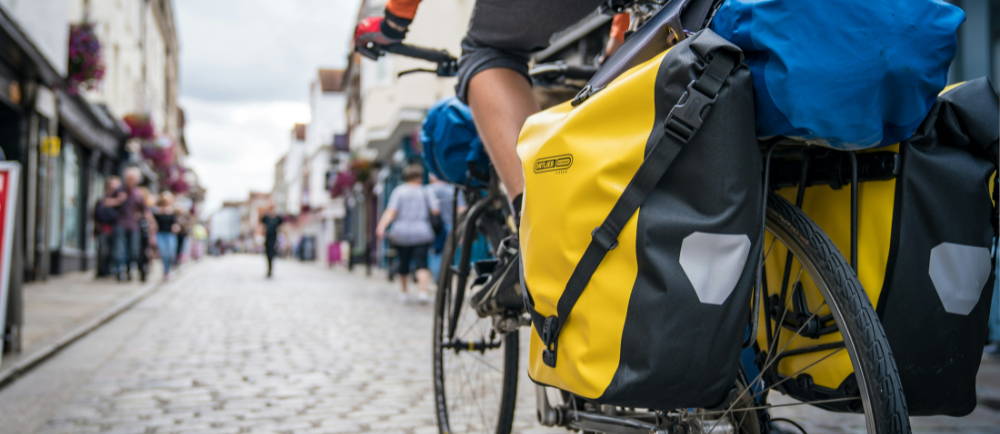 Cyclist with panniers on bike