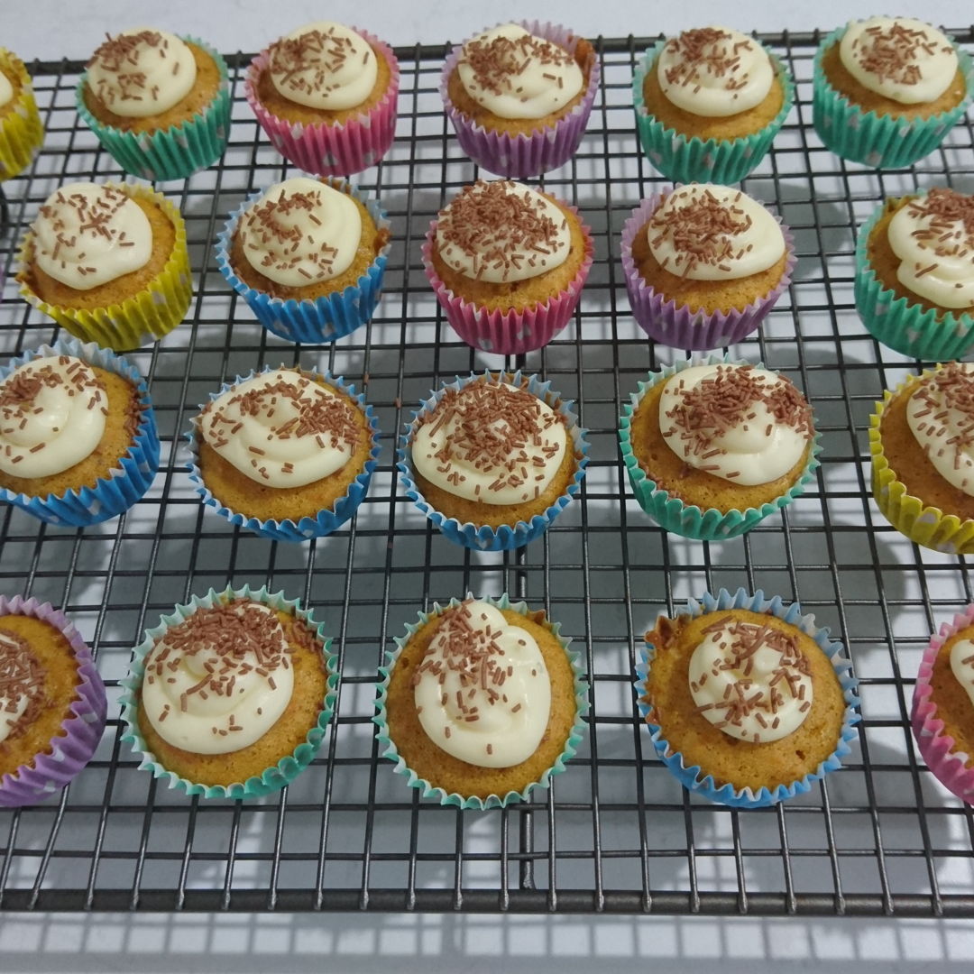 Date: 3 Jan 2020 (Fri)
19th Carrot Cake Cupcakes: [169] [135.6%] [Score: 8.0]
I had always wanted to make cupcakes/muffins. I thought the fastest way to learn to make them is to buy a Prinetti Cupcake Making Kit. In the Kit there’s a booklet showing 7 recipes to make cupcakes/muffins. This is the third of the seven. 
1.	Number of mini cupcake made (half the amount of ingredients suggested in the recipe!): 68
2.	Icing: Philadelphia Icing
3.	Topping: Coles choc sprinkles