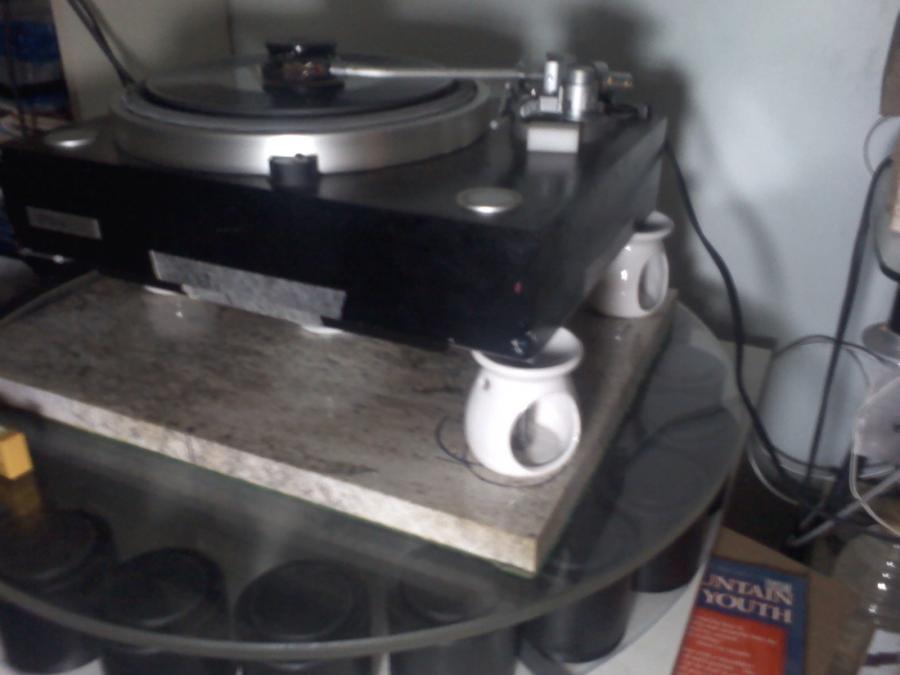 Incense burners with Silicon Nitride balls atop marble slab