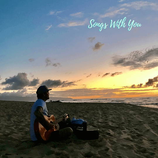 Songs With You musician creating song on beach