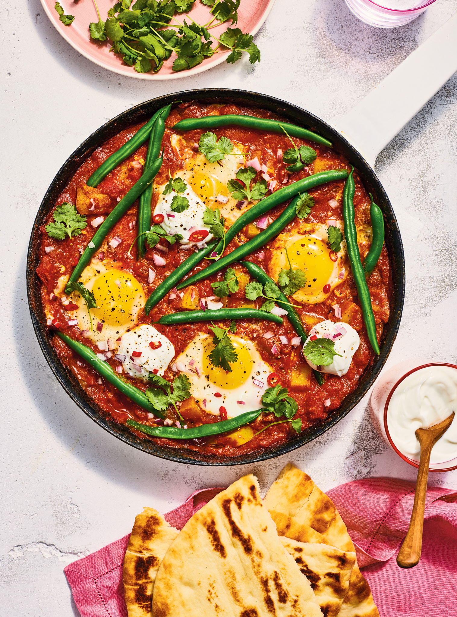 Poached Eggs in Indian-Style Tomato Sauce | RICARDO