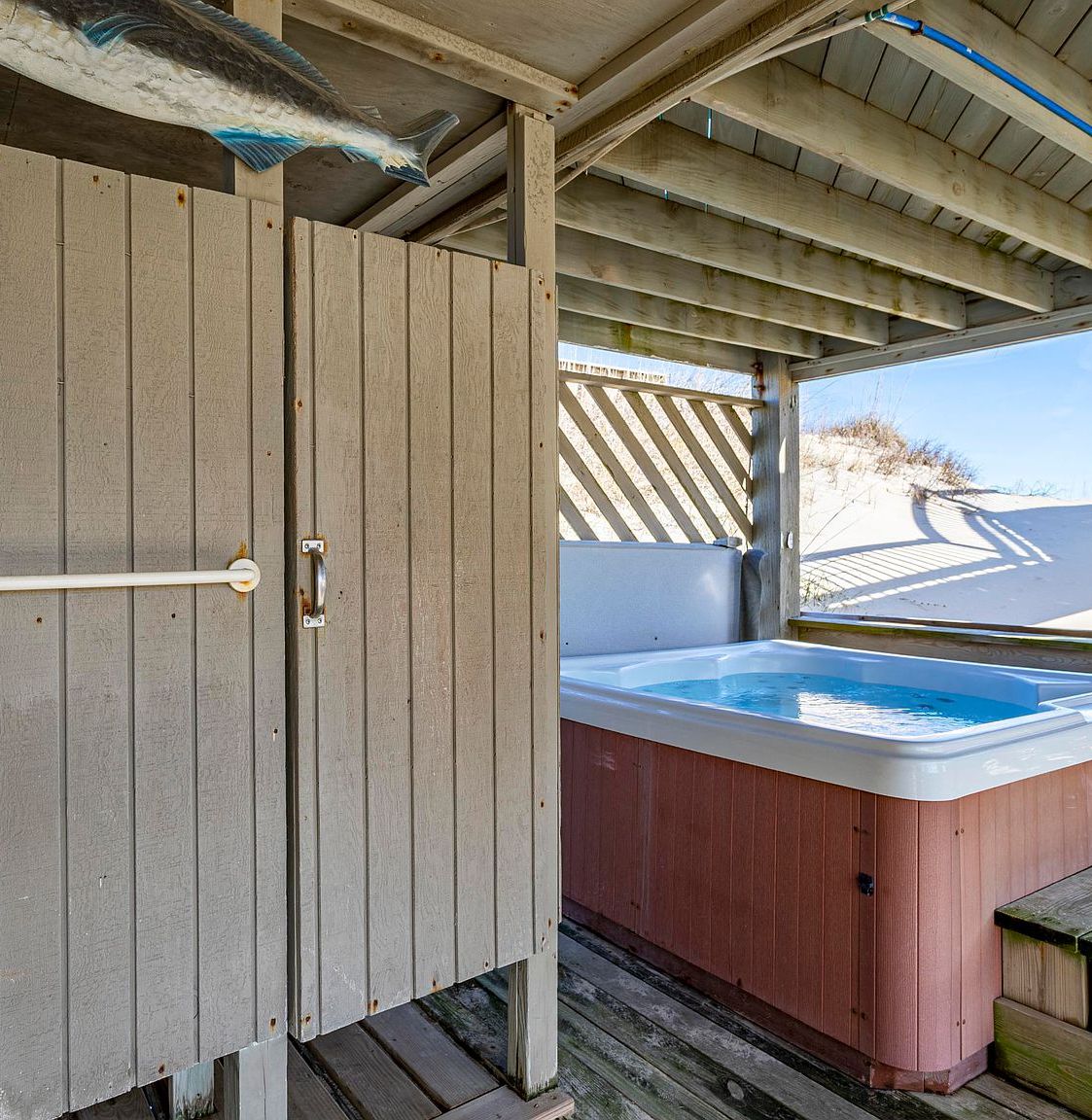exterior space with hot tub