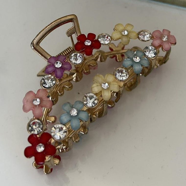 golden hair clip with flowers