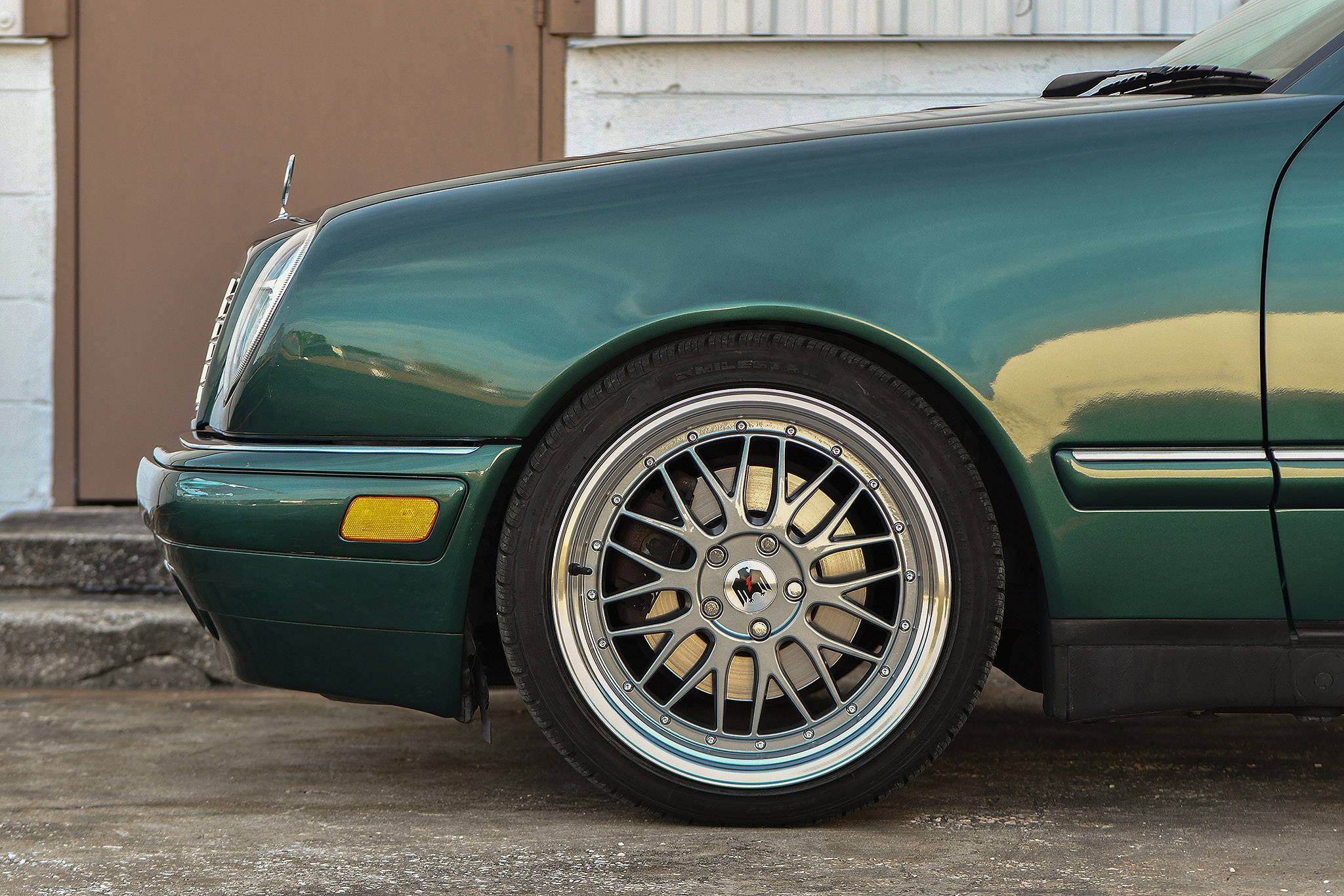 green mercedes E class wagon on gunmetal machined klassik rader pro trak wheels