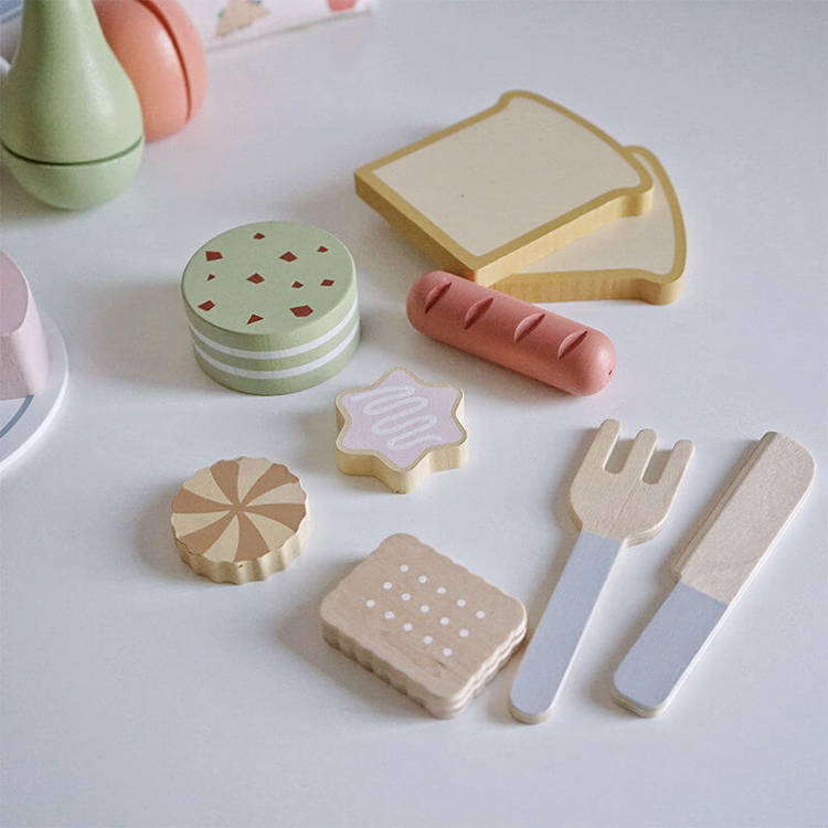 Wooden pieces of the Montessori Picnic Set.