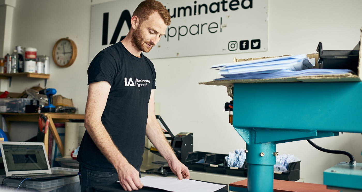 Founder Robert Manley at work in the Illuminated Apparel workshop