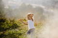 Little girl running with hands wide open. 