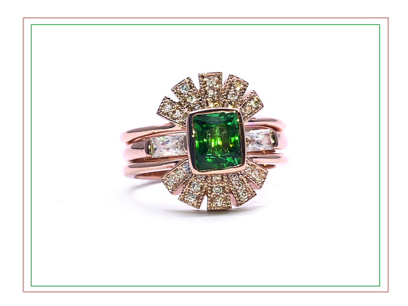 rose gold inca ring with diamond and emerald