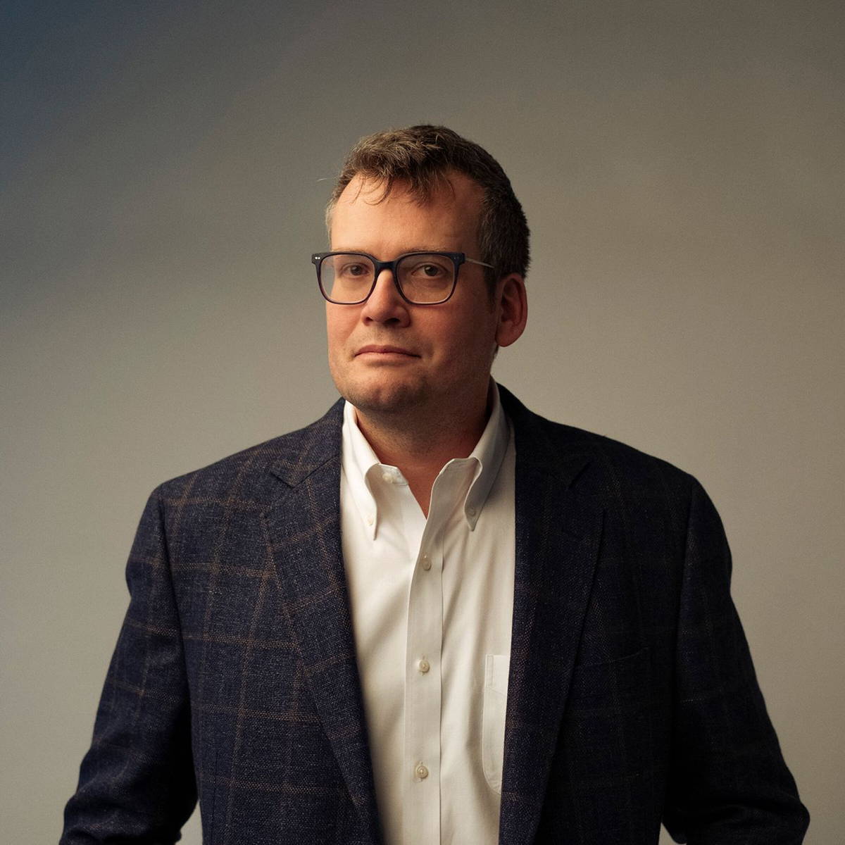 Image may contain: John Green, Blazer, Clothing, Coat, Jacket, Face, Head, Person, Photography, Portrait, and Formal Wear