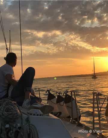 Enjoy a relaxing sunset cruise along the Tagus River