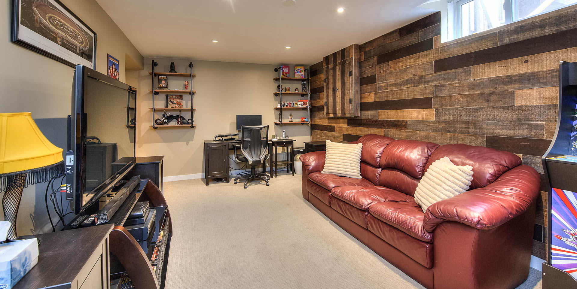 living room with carpet, natural light, and TV