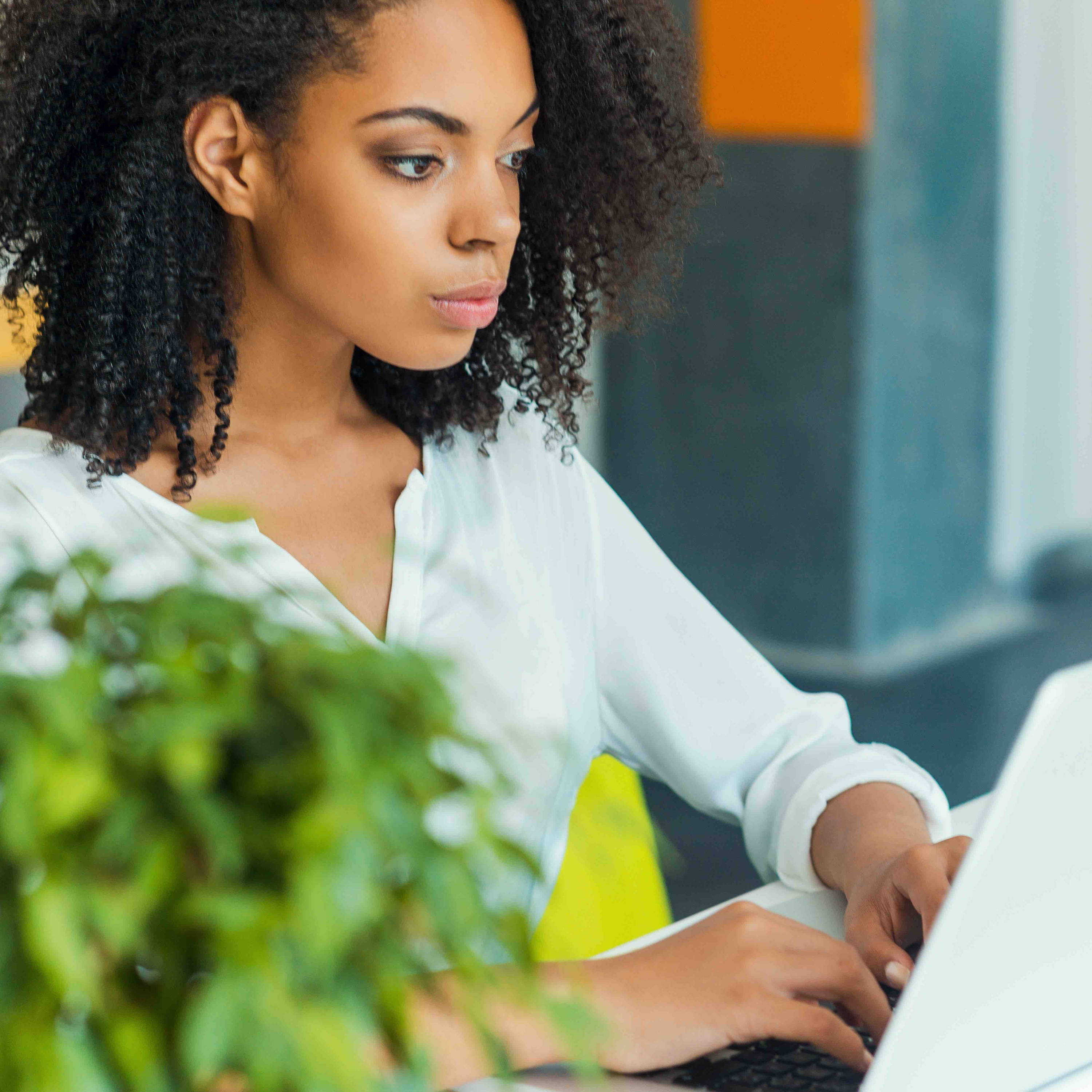 Woman with computer at work