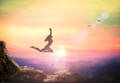 woman jumping, rainbow background, hope