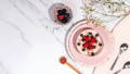 vegan collagen in a breakfast bowl wvegan collagen breakfast of oats and berries in a bowl with vegan collagen powderith berries